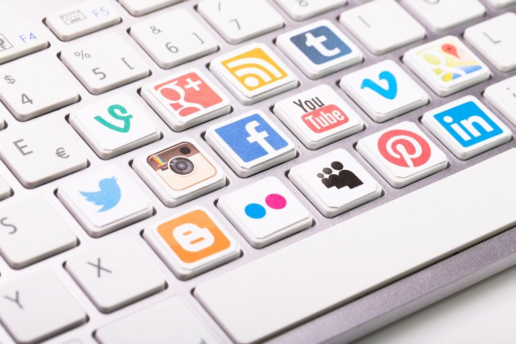 Keyboard keys with social media logos