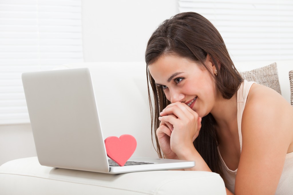 Woman having a date online