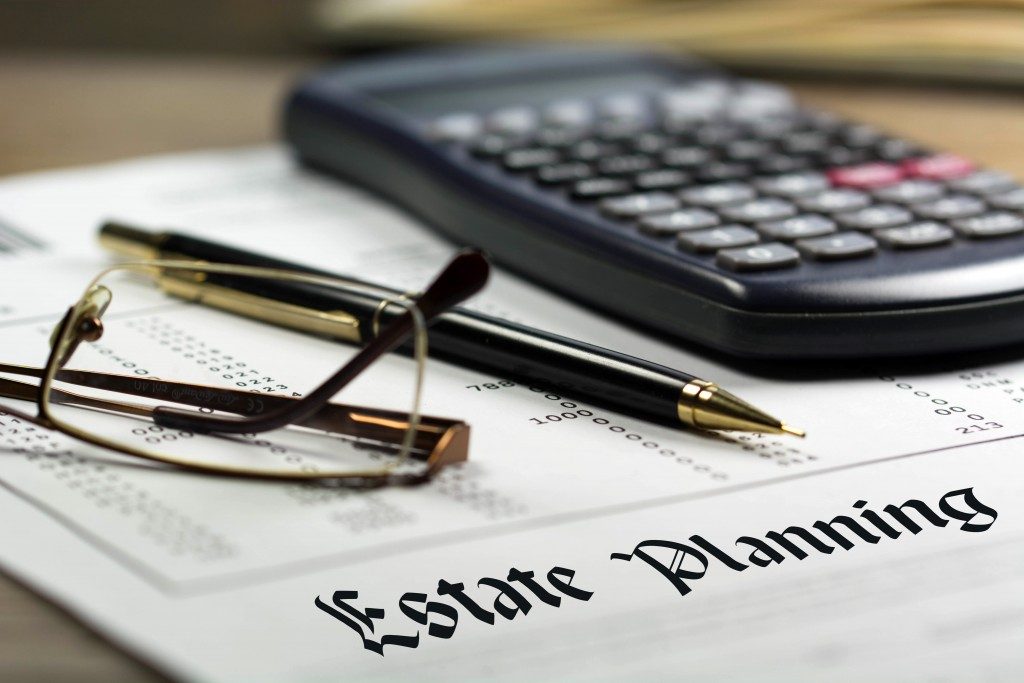 estate planning word written on real estate brokerage concept