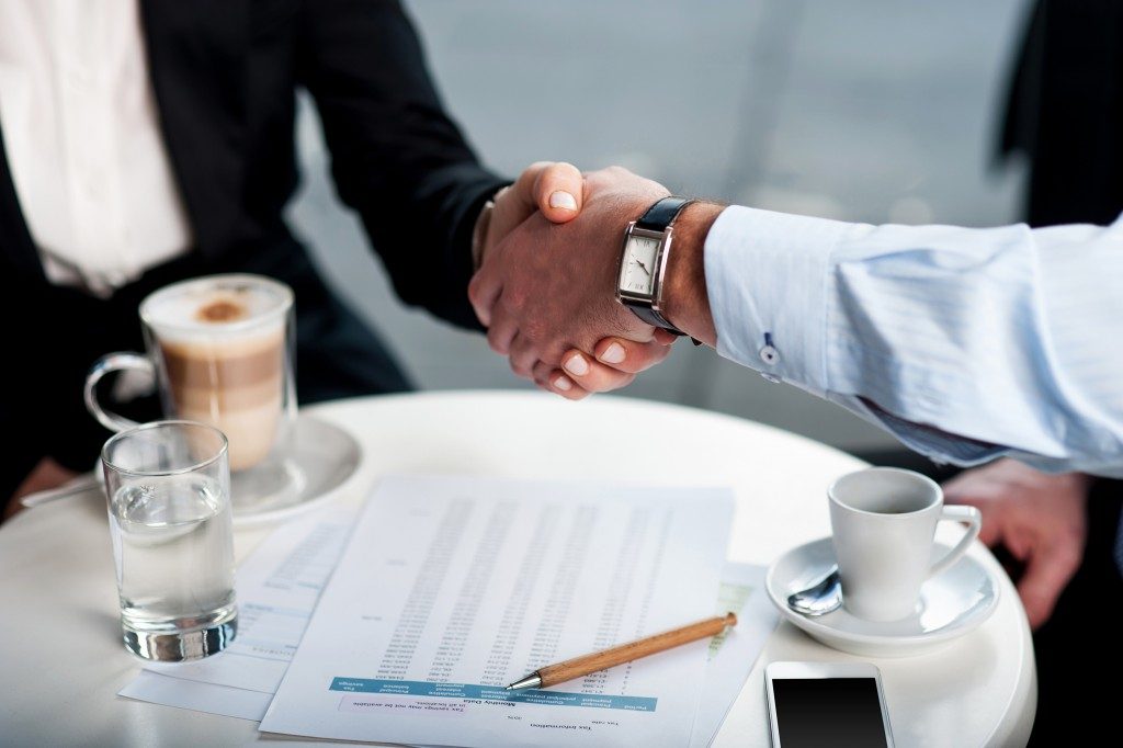Entrepreneurs shaking hands