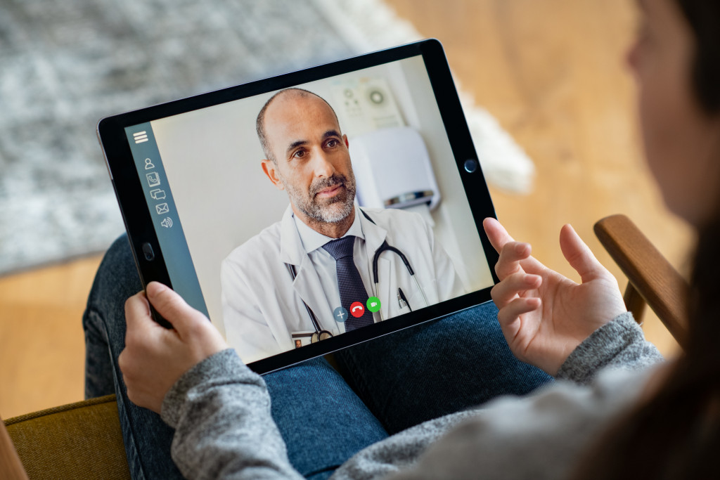 patient in video conferencing with general practitioner